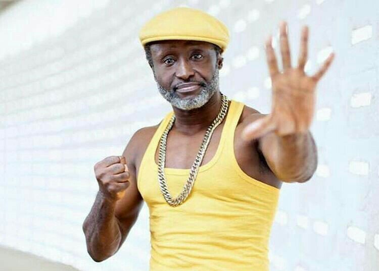 It is not wrong for artistes to enhance their musical career with juju-Reggie Rockstone jabs critics