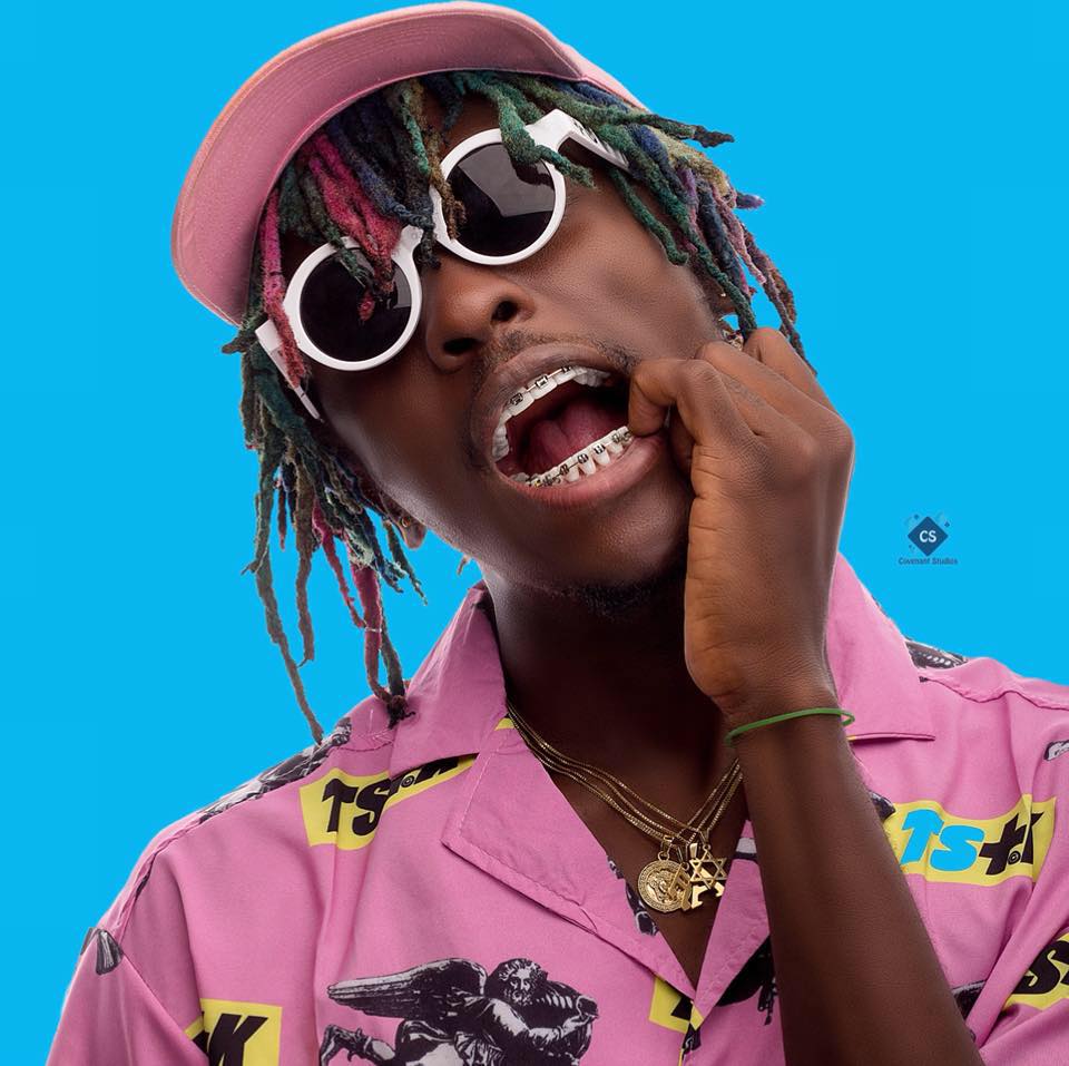 Kofi Mole falls offstage during a live performance at the 21st VGMA